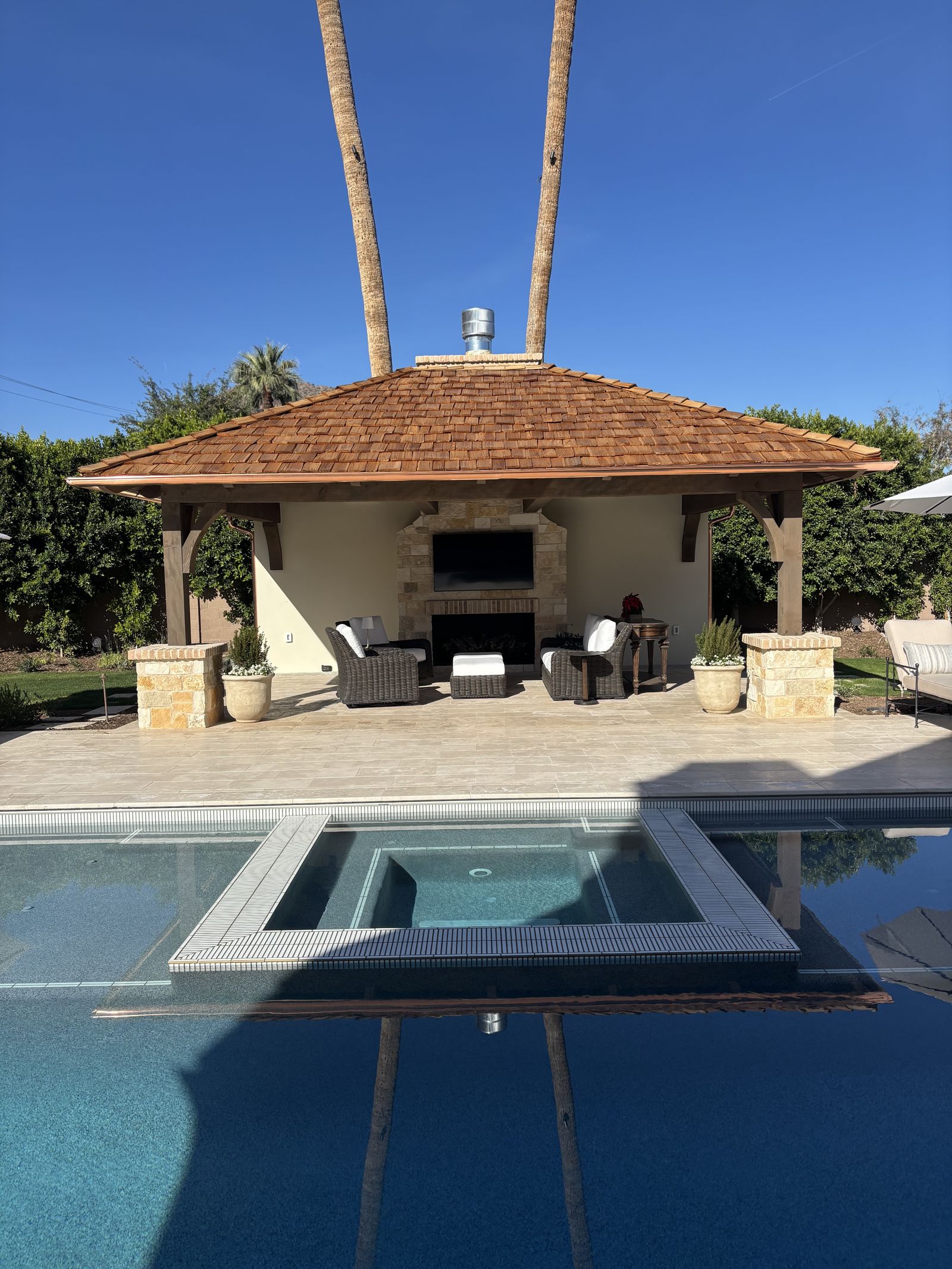 Copper-guttered pool cabana with cedar shake roof — Grizzly Rain Gutters