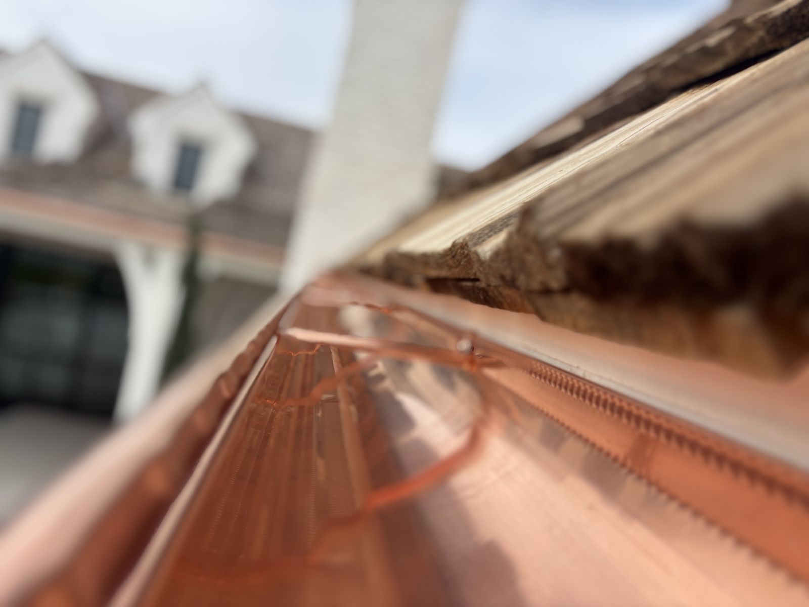 Close-up of copper gutter with soldered seam — Grizzly Rain Gutters craftsmanship